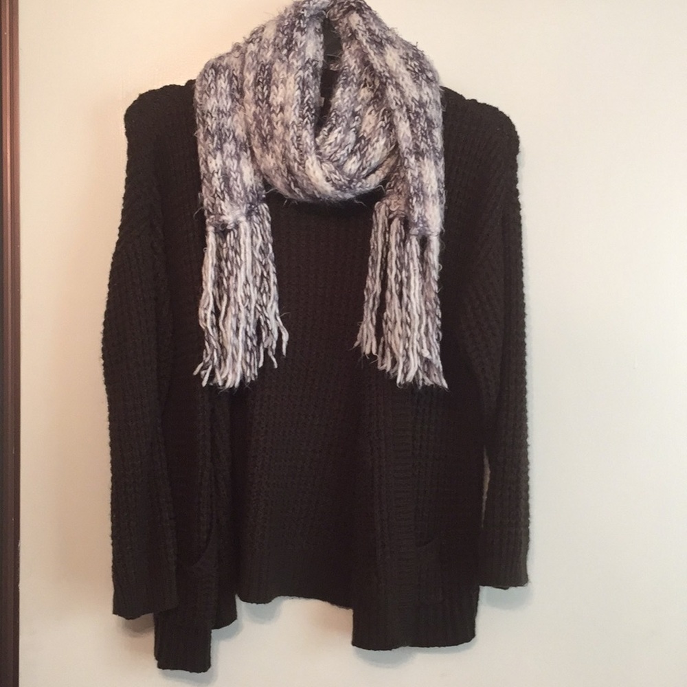 Personally knit grey and white scarf.